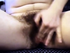 Webcam Hairy playing with big clit