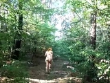 chubby girl with big booty walking nude in forest