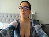 Big boob brunette masturbates on webcam