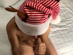 Sexy girl sucking cock in Santa Claus Christmas hat, DEEP BL
